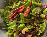 A picture of step 3 of Nutty fruity salad 🥬.