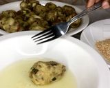 A picture of step 8 of Cheesy lamb and potatoes kupta.