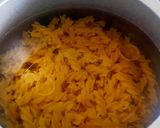 A picture of step 1 of Italian white sauce pasta.