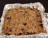 A picture of step 8 of Fresh Berrie Crumble Bars with White and Milk Chocolate Glaze.