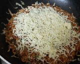 A picture of step 10 of Maggi Nutrilicious Masala VEG ATTA noodles Vegetables pizza.
