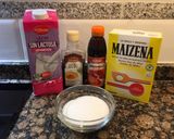 A picture of step 1 of Eggless Cornstarch Flan.