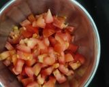 A picture of step 1 of Sev Tamata with Garlic.