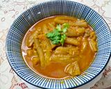 A picture of step 3 of Stuffed torai in onion gravy.