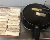 A picture of step 8 of Cheat Day Crispy pork spring rolls.