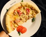 A picture of step 25 of Chicken pizza.