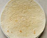 A picture of step 6 of Mexican chicken enchiladas.