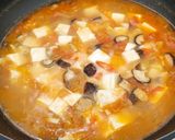 A picture of step 10 of Tomato mushroom tofu soup.