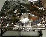 A picture of step 6 of Rosemary Roasted Potatoes & Onions.