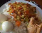 A picture of step 2 of White rice with turmeric, tomatoes sauce & Egg.