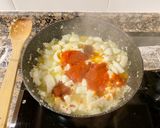 Foto del paso 4 de la receta: “ Arroz meloso” con anillas de pota