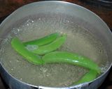 A picture of step 3 of Snap Peas and Tomatoes with Yuzu Pepper.