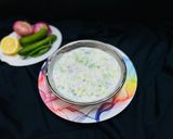 A picture of step 2 of Cucumber onion raita.