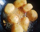 A picture of step 2 of Kashmiri Aloo Dum.