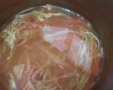 A picture of step 2 of Tomato Egg Drop Soup.