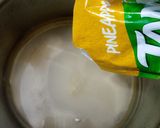 A picture of step 3 of Tang Pineapple.