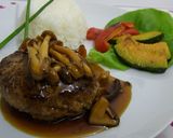 A picture of step 11 of The Best Japanese-Style Hamburger Patties with Mushroom Sauce.