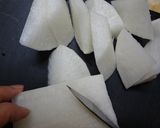 A picture of step 1 of Korean Simmered Daikon Radish Soboro.