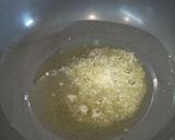 A picture of step 6 of Kaande Matar Pohe (Savory Flattened Rice With Green Peas).