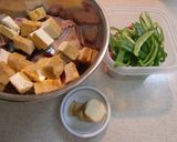 A picture of step 1 of Delicious Mackerel and Deep Fried Tofu with a Thick and Sweet Vinegar Sauce.