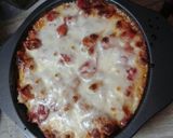 A picture of step 6 of Cheesy, tomato ,and rice with a little meat pie.