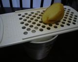 A picture of step 2 of Piping Hot! Honey and Ginger Milk.