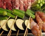 A picture of step 5 of Kushikatsu (Deep Fried Skewers) from Shinsekai in Osaka.