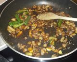 A picture of step 9 of Dry chili Mushrooms.