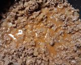 A picture of step 6 of Meaty Onionie Sauce, On Hotdogs.