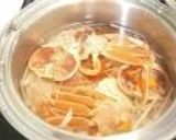 A picture of step 5 of Snow Crab in a Delicious Broth.