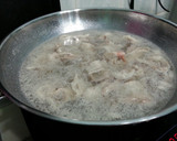 A picture of step 1 of Bak Choy And Dumpling In Pork Broth.