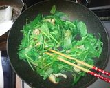 A picture of step 4 of Stir-Fried Ong Choy (Chinese Water Spinach) with Leftover Chicken Skin.