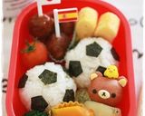 A picture of step 14 of Charaben Rilakkuma made from Mini Sausages.