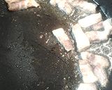 A picture of step 2 of Turmeric eggs with shallots and pork belly.