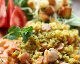 A picture of step 9 of Curry Pilaf with Chicken in Tomato-Cream Sauce.
