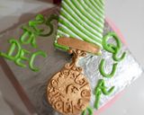 A picture of step 17 of Quaid e Azam police Medal QPM coffee cake.