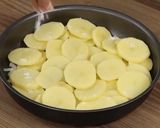 Foto del paso 4 de la receta: Pechuga de pollo con papas y queso manchego