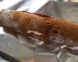 A picture of step 10 of Thanksgiving Pumpkin Roll.