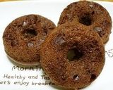 A picture of step 10 of Baked Dark Chocolate Donuts Made with Pancake Mix.