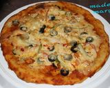 A picture of step 9 of Chicken tikka pizza without oven.