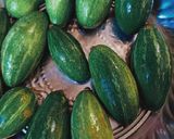 A picture of step 1 of Bharwa Parwal (Stuffed Pointed Gourd).