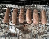 A picture of step 5 of Sausages with roasted vegetables in a tomato sauce.