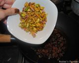 A picture of step 3 of Persian Pomegranate Rice with Pistachio and Raisins.