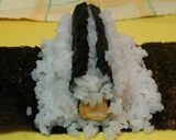 A picture of step 11 of Decorated Sushi Rolls: Snowmen Nori Rolls.