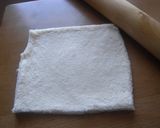 A picture of step 2 of Sliced Bread Apple Pie.