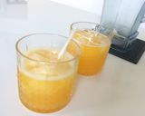 A picture of step 1 of Honey - Orange Smoothies.