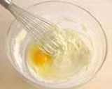 A picture of step 5 of Easy Just Mix Cheesecake.