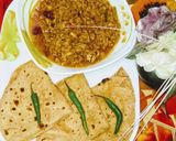 A picture of step 6 of Bhunna qeema with chapati.