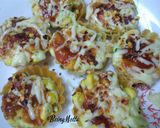 A picture of step 5 of Corn capsicum cheese tarts.