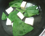 A picture of step 3 of A Simple Soup with Spinach and Tofu.